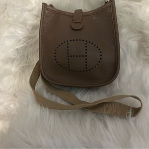 Tan H crossbody